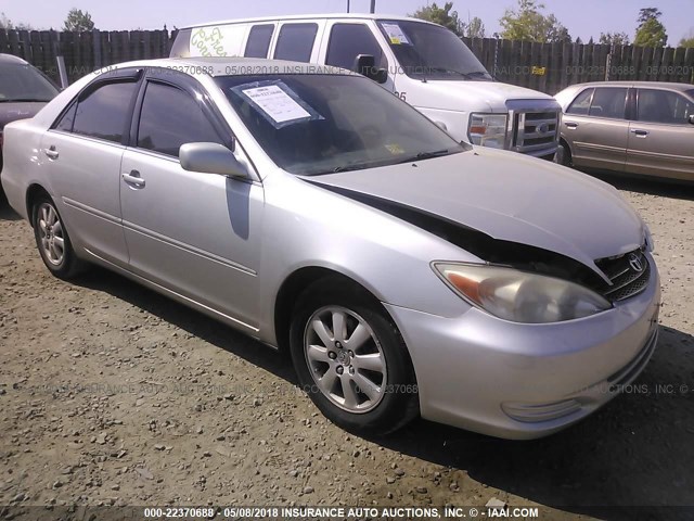 4T1BF30KX2U506758 - 2002 TOYOTA CAMRY LE/XLE/SE SILVER photo 1