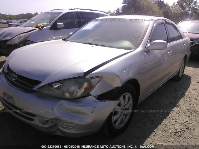 4T1BF30KX2U506758 - 2002 TOYOTA CAMRY LE/XLE/SE 银色 照片 2