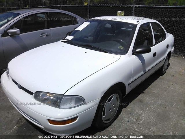 1Y1SK5264VZ456292 - 1997 GEO PRIZM LSI WHITE photo 2