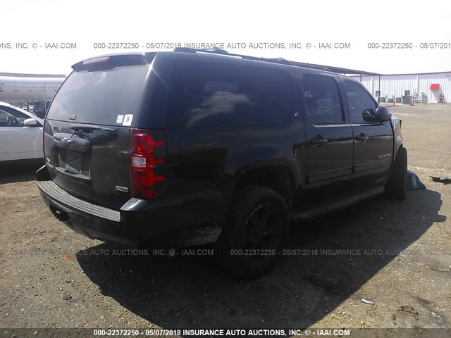 1GNUKJE31AR139739 - 2010 CHEVROLET SUBURBAN K1500 LT BLACK photo 4