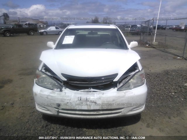 JTDBE32K940274054 - 2004 TOYOTA CAMRY LE/XLE WHITE photo 6