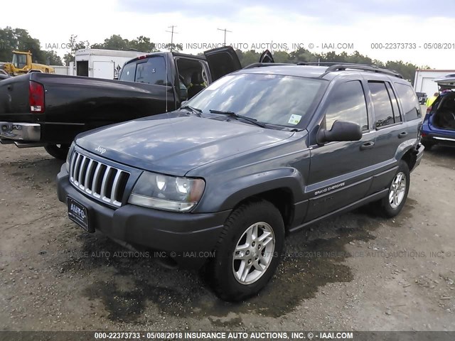 1J4GW48S14C188701 - 2004 JEEP GRAND CHEROKEE LAREDO/COLUMBIA/FREEDOM BLUE photo 2