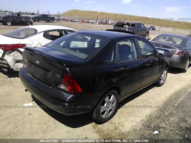 1FAFP38373W140849 - 2003 FORD FOCUS ZTS BLACK photo 4