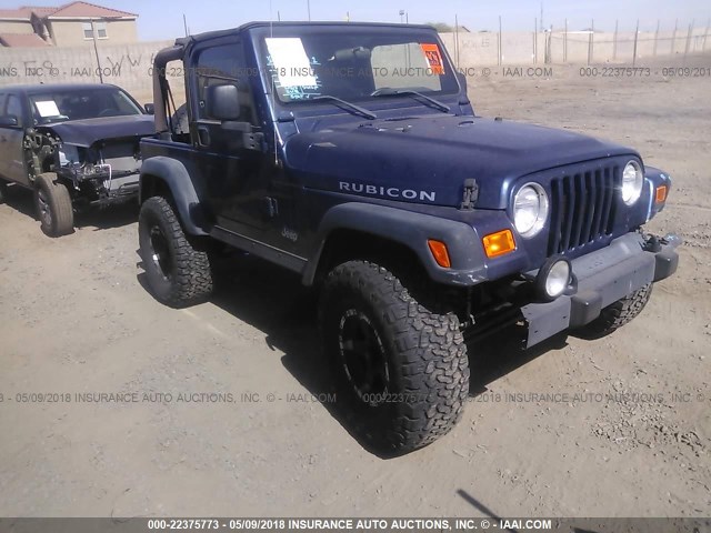 1J4FA69S74P742465 - 2004 JEEP WRANGLER / TJ RUBICON BLUE photo 1