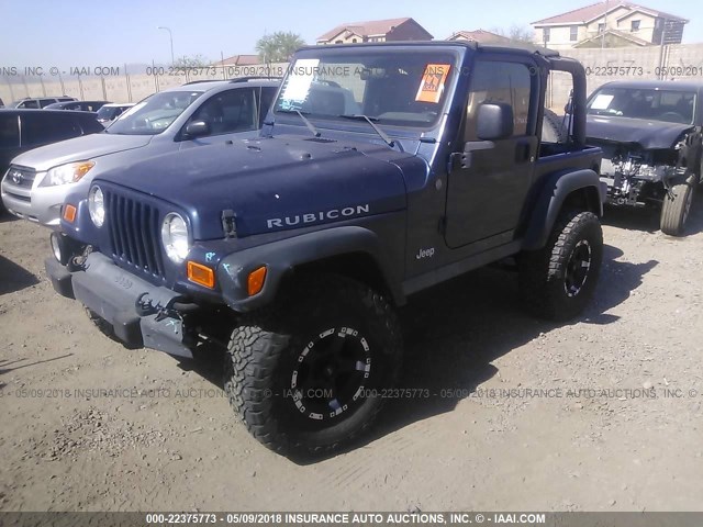 1J4FA69S74P742465 - 2004 JEEP WRANGLER / TJ RUBICON BLUE photo 2