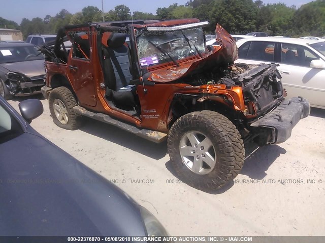 1J4BA3H16BL527119 - 2011 JEEP WRANGLER UNLIMITE SPORT ORANGE photo 1