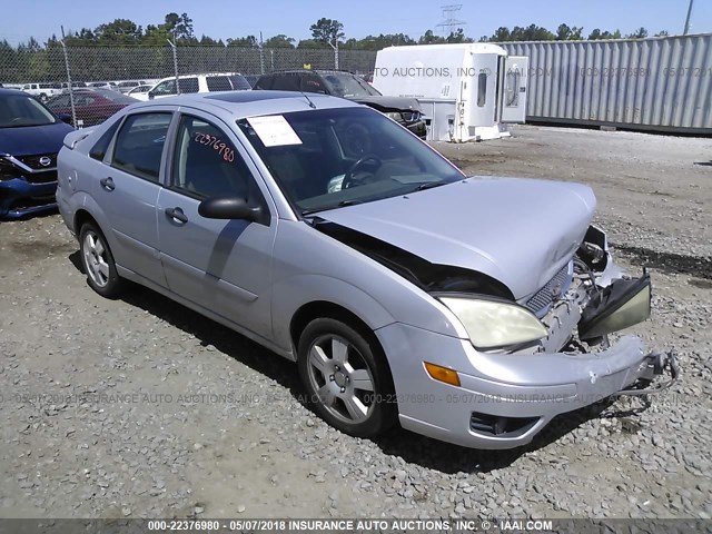 1FAFP34NX7W182879 - 2007 FORD FOCUS ZX4/S/SE/SES SILVER photo 1