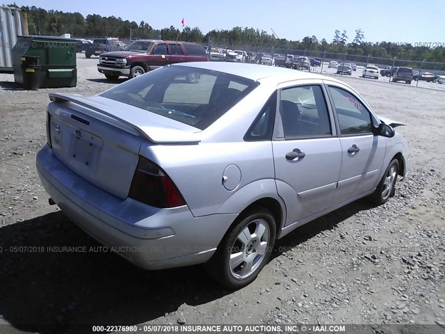 1FAFP34NX7W182879 - 2007 FORD FOCUS ZX4/S/SE/SES SILVER photo 4