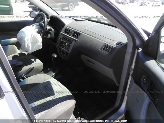 1FAFP34NX7W182879 - 2007 FORD FOCUS ZX4/S/SE/SES 银色 照片 5