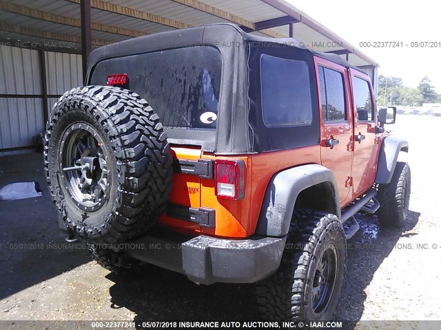 1C4HJWDG8FL616479 - 2015 JEEP WRANGLER UNLIMITE SPORT ORANGE photo 4