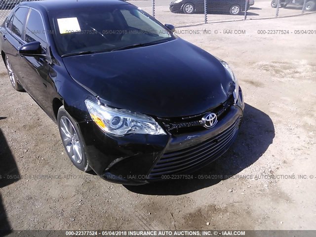 4T4BF1FK0GR579694 - 2016 TOYOTA CAMRY LE/XLE/SE/XSE Noir photo 6