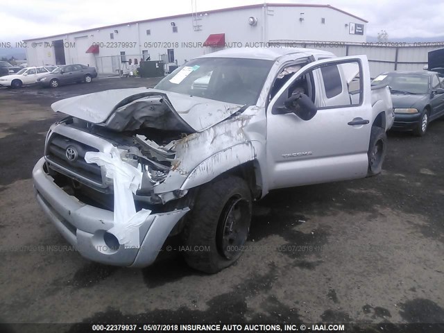 5TEUX42N09Z598701 - 2009 TOYOTA TACOMA ACCESS CAB Silber Foto 2