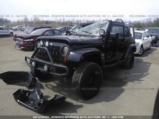 1J8GA59188L611675 - 2008 JEEP WRANGLER UNLIMITE SAHARA BLACK photo 2