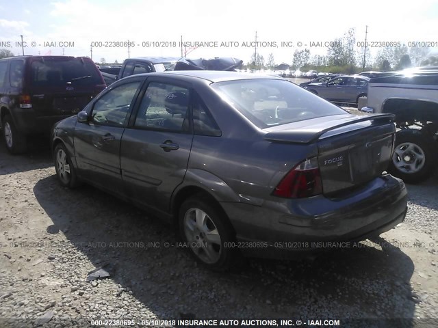 1FAFP38Z75W202032 - 2005 FORD FOCUS ZX4 ST GRAY photo 3