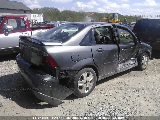 1FAFP38Z75W202032 - 2005 FORD FOCUS ZX4 ST GRAY photo 4