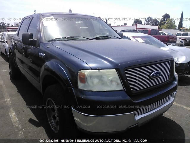 1FTPW12594KB79970 - 2004 FORD F150 SUPERCREW Dark Blue photo 1