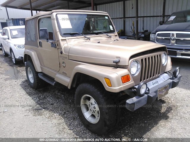 1J4FA59S6YP724149 - 2000 JEEP WRANGLER / TJ SAHARA GOLD photo 1