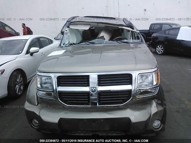 1D8GU58K77W657781 - 2007 DODGE NITRO SLT TAN photo 6