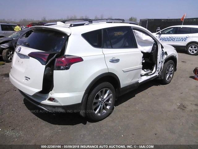 JTMDFREV7GJ062105 - 2016 TOYOTA RAV4 LIMITED WHITE photo 4