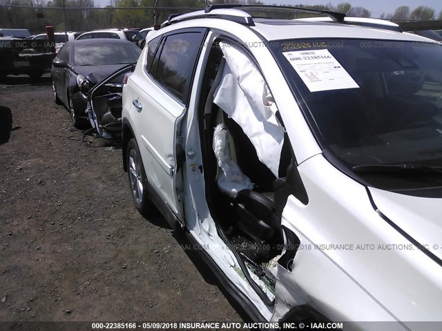 JTMDFREV7GJ062105 - 2016 TOYOTA RAV4 LIMITED WHITE photo 6