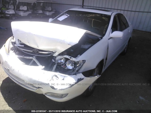 JTDBE32K740283691 - 2004 TOYOTA CAMRY LE/XLE WHITE photo 2