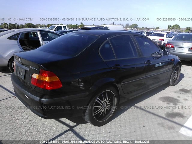 WBAEU33483PF58944 - 2003 BMW 325 XI BLACK photo 4