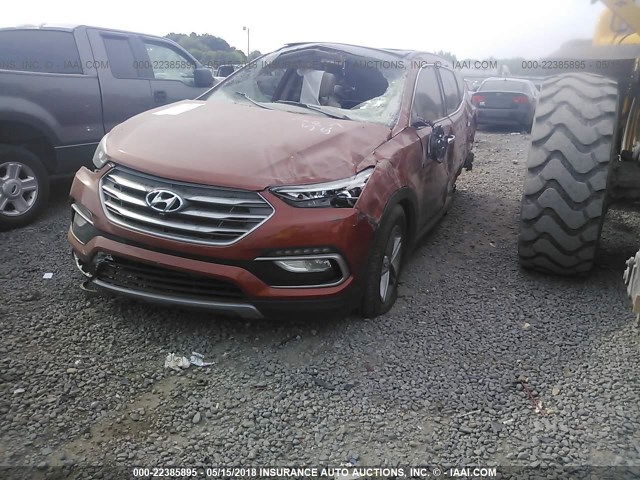 5XYZU3LB2HG486200 - 2017 HYUNDAI SANTA FE SPORT  ORANGE photo 2