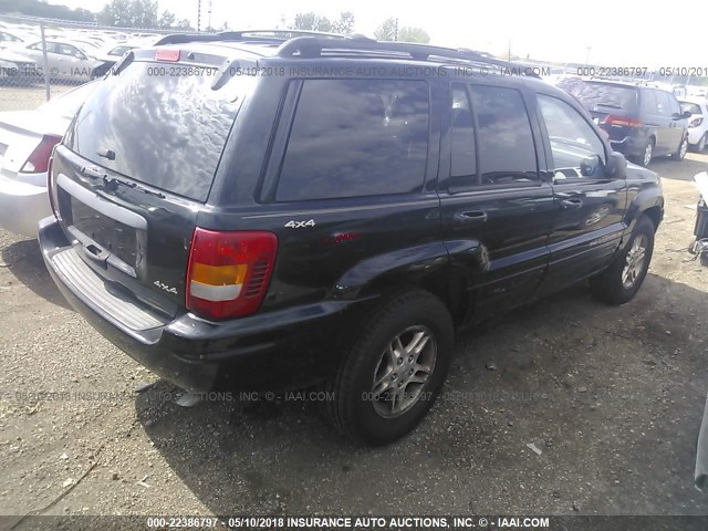 1J4GW68N5XC791807 - 1999 JEEP GRAND CHEROKEE LIMITED BLACK photo 4