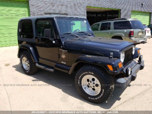 1J4FY49S1XP424944 - 1999 JEEP WRANGLER / TJ SAHARA BLACK photo 1