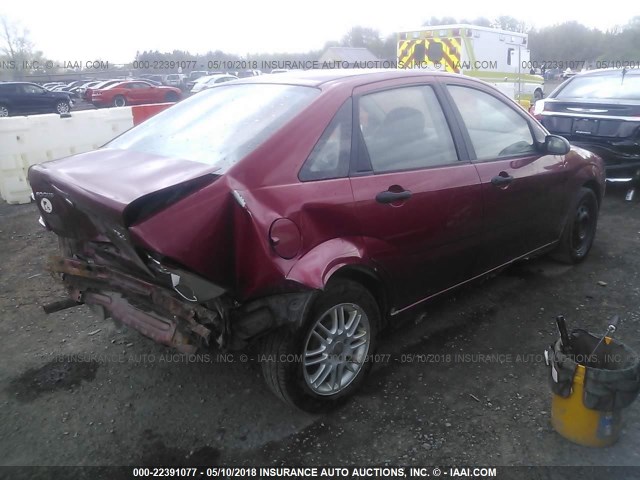 1FAFP34N65W216524 - 2005 FORD FOCUS ZX4 RED photo 4