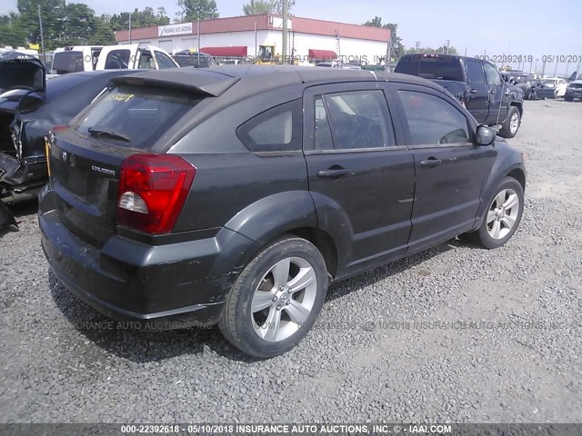 1B3CB3HA2BD110809 - 2011 DODGE CALIBER MAINSTREET BLACK photo 4