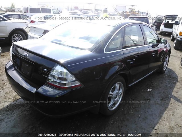 1FAHP24W38G156017 - 2008 FORD TAURUS SEL BLACK photo 4