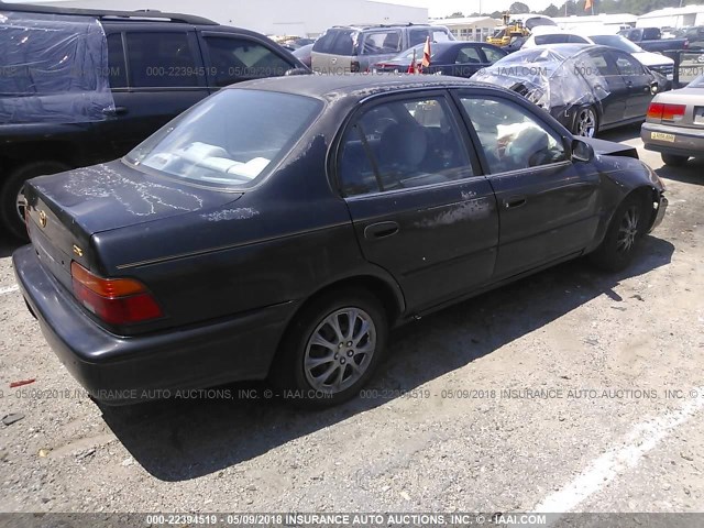 JT2AE09B7S0088020 - 1995 TOYOTA COROLLA LE/DX შავი ფოტო 4