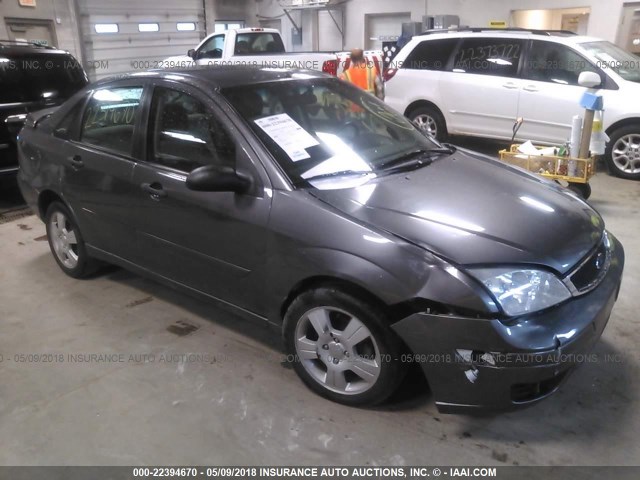 1FAHP34N27W174056 - 2007 FORD FOCUS ZX4/S/SE/SES GRAY photo 1