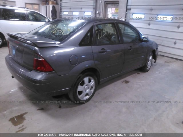 1FAHP34N27W174056 - 2007 FORD FOCUS ZX4/S/SE/SES GRAY photo 4