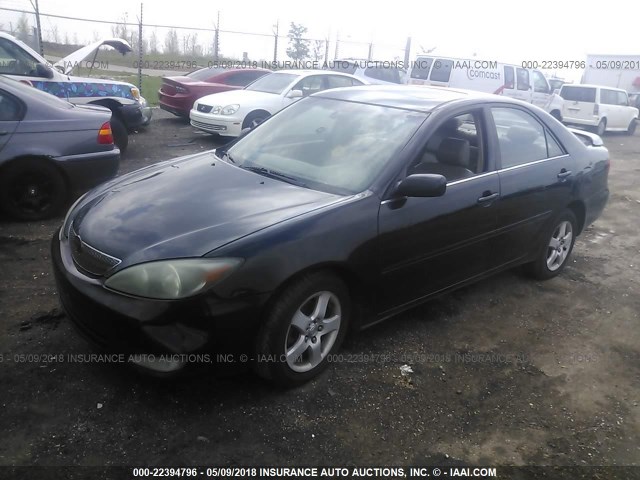 4T1BF30KX2U001593 - 2002 TOYOTA CAMRY LE/XLE/SE BLACK photo 2