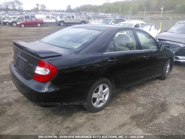 4T1BF30KX2U001593 - 2002 TOYOTA CAMRY LE/XLE/SE BLACK photo 4