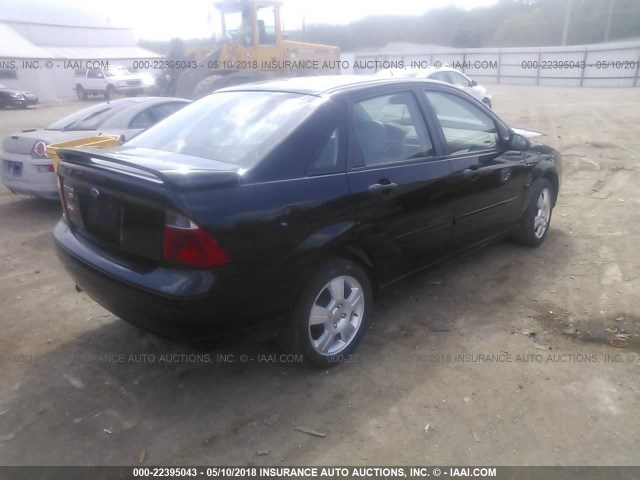 1FAHP34NX7W264300 - 2007 FORD FOCUS ZX4/S/SE/SES BLACK photo 4