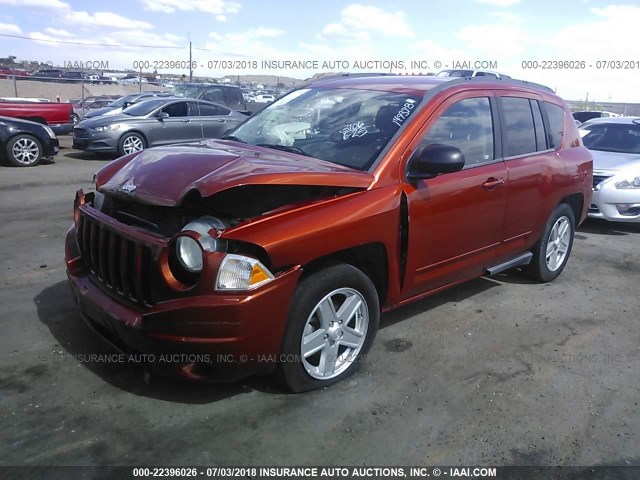 1J4NT4FB7AD593762 - 2010 JEEP COMPASS SPORT ORANGE photo 2