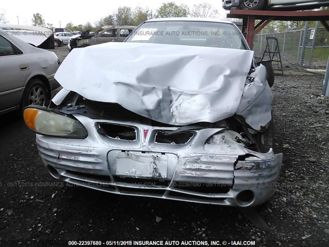 1G2NF52F42C269630 - 2002 PONTIAC GRAND AM SE1 SILVER photo 6