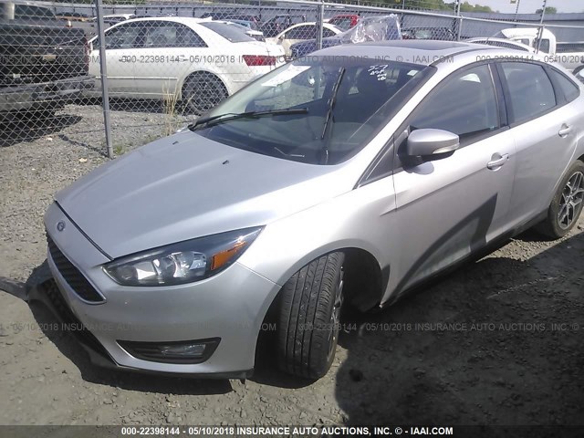 1FADP3H28HL256486 - 2017 FORD FOCUS SEL SILVER photo 2