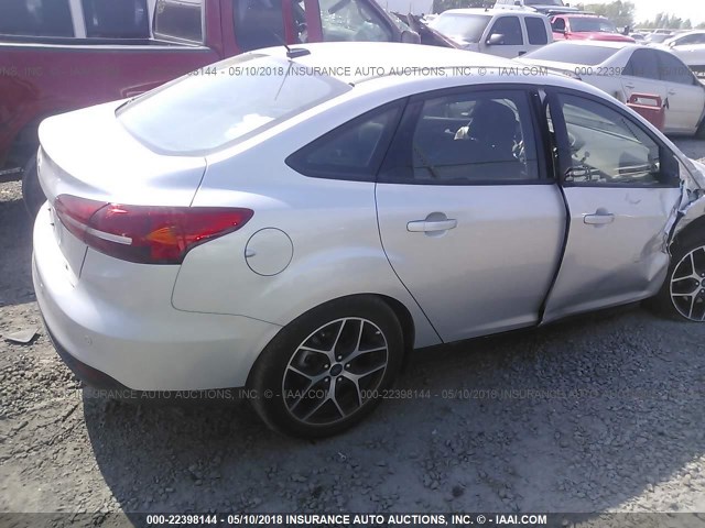 1FADP3H28HL256486 - 2017 FORD FOCUS SEL SILVER photo 4
