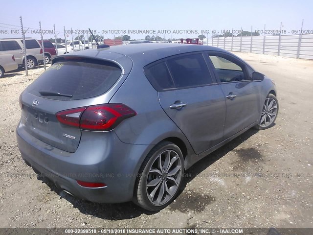 3KPFN5A31JE192636 - 2018 KIA FORTE EX/SX GRAY photo 4