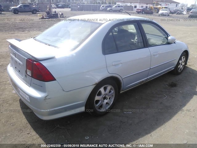 JHMES95604S009999 - 2004 HONDA CIVIC HYBRID Light Blue photo 4