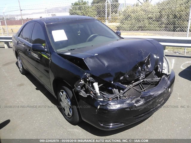 4T1BE32KX3U230910 - 2003 TOYOTA CAMRY LE/XLE/SE შავი ფოტო 1