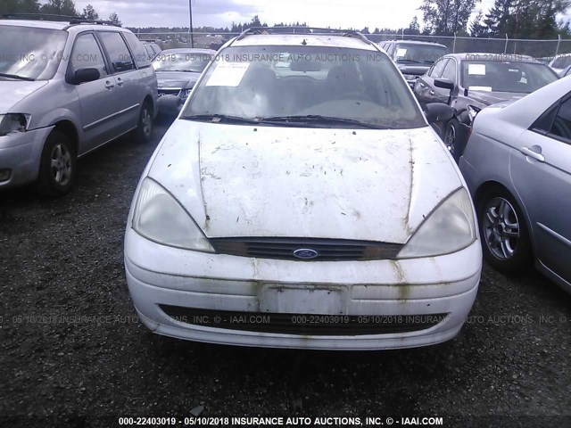 1FAFP36P0YW319179 - 2000 FORD FOCUS SE/SE COMFORT WHITE photo 6