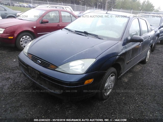 1FAFP33P34W197657 - 2004 FORD FOCUS LX BLUE photo 2