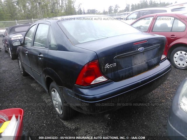 1FAFP33P34W197657 - 2004 FORD FOCUS LX BLUE photo 3