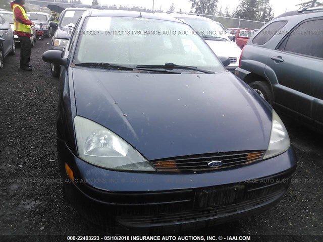 1FAFP33P34W197657 - 2004 FORD FOCUS LX BLUE photo 6