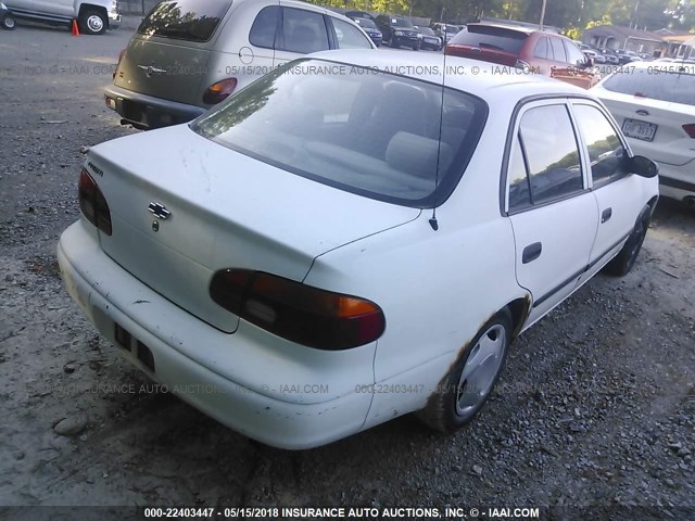 1Y1SK5283XZ431906 - 1999 CHEVROLET GEO PRIZM LSI WHITE photo 4